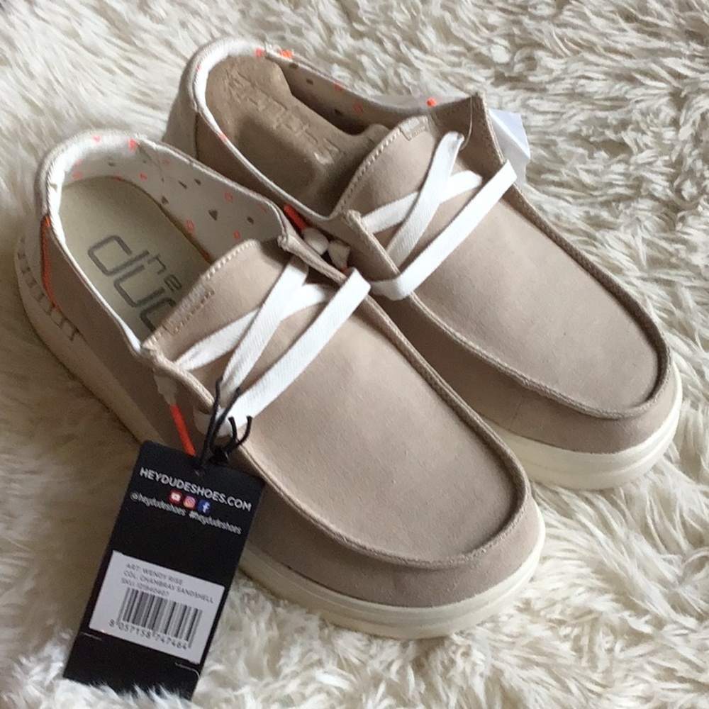 Brand new Hey Dude Wendy rise.  color chambray Sandshell with extra laces size 5